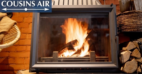 Logs in a fireplace on fire