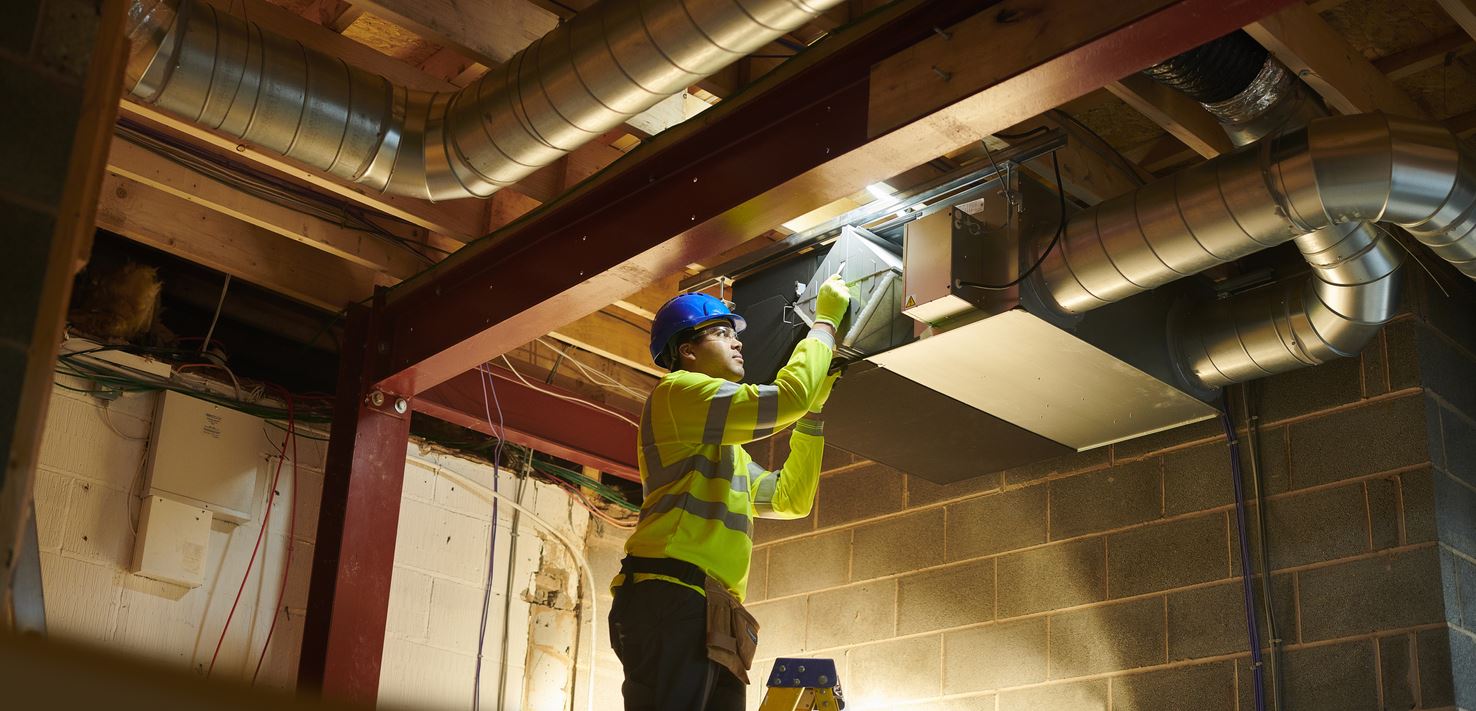Man installing filter.
